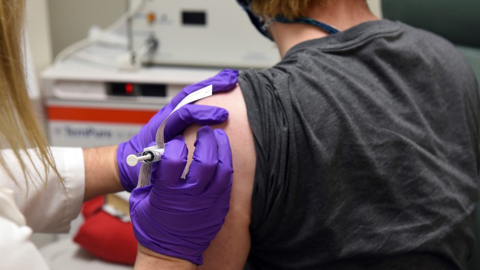 COVID-19 vaccine trial participants report aches, fevers and chills