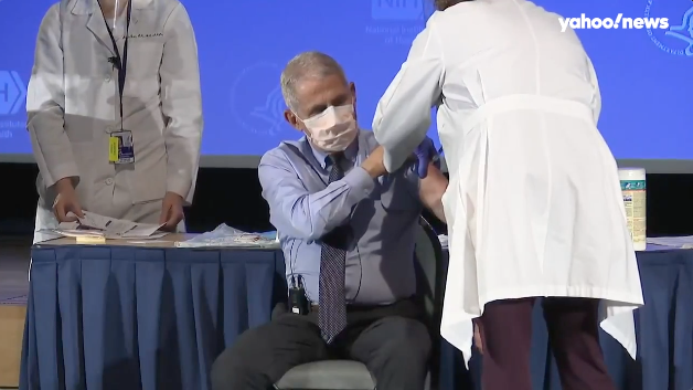 Dr. Anthony Fauci receives his first dose of the COVID-19 vaccine