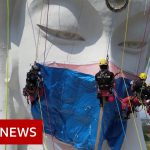 Giant Buddhist statue gets Covid face mask in Japan – BBC News