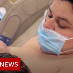 Mothers told to wear face masks during labour – BBC News
